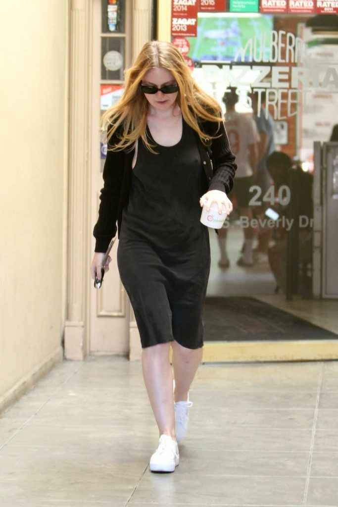 Dakota Fanning a les seins qui pointent à New-York