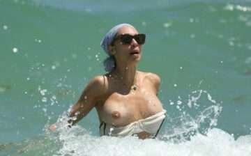 Oups ! Lilly Becker seins nus à la plage